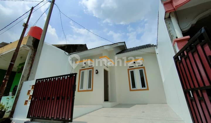 Rumah Desain Minimalis60 di Perumahan Grand Residence City