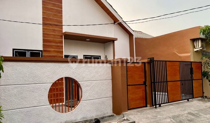 Rumah Baru Keren Modern Nuansa Kayu Di Harapan Indah Bekasi