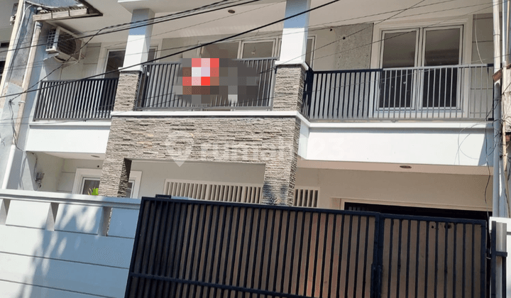 Rumah Minimalis Jalan 2 Mobil