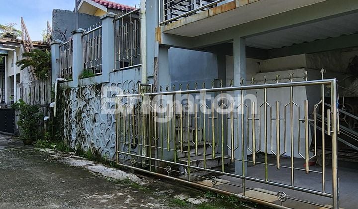 A THREE-STOREY HOUSE WITH FIVE BEDROOMS
