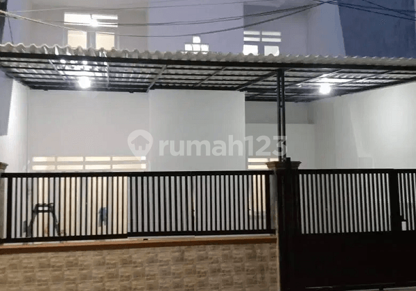 Rumah di Rungkut Asri Baru Renov Like New Siap Pakai