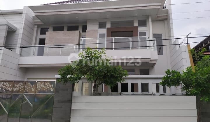 Rumah New Minimalis di Dharmahusada Indah Dekat Raya