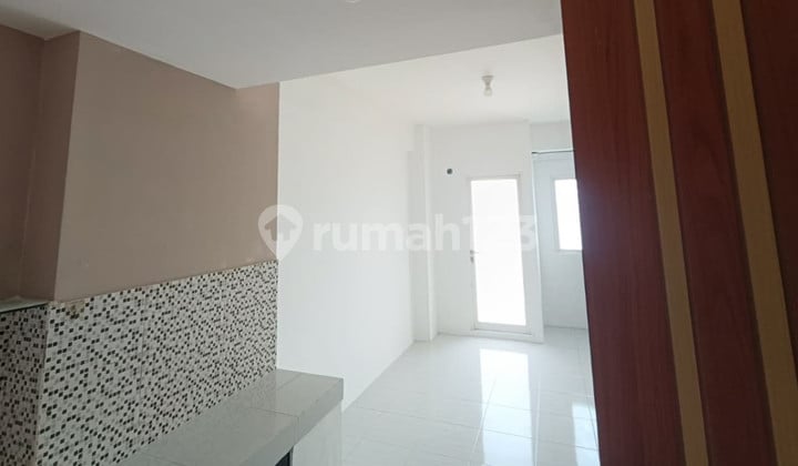 Apartemen Puncak Dharmahusada Surabaya
