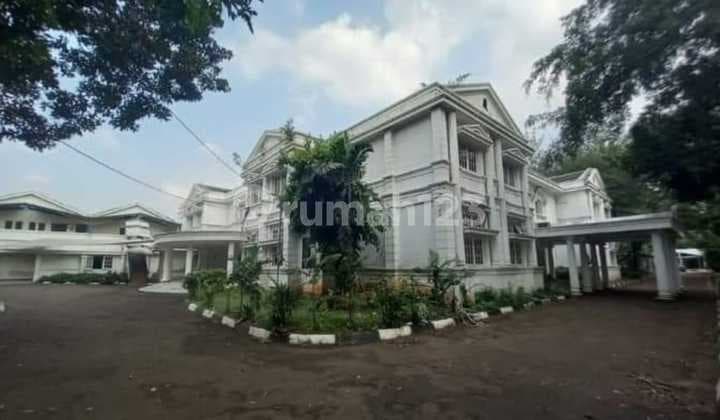 tanah di kemang timur raya dan ada bangunannya,jakarta selatan afrida owr