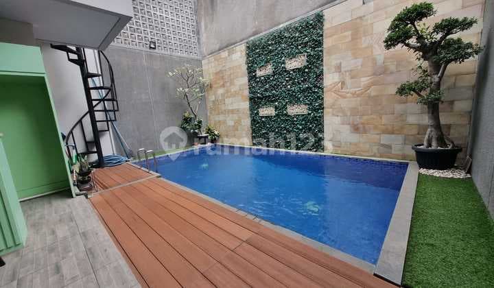 House for Sale in Kota Baru Parahyangan with a Swimming Pool