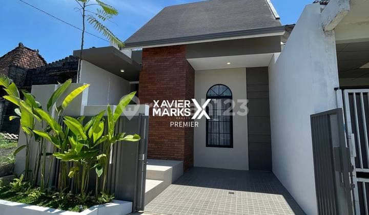 English: "For Sale, New Modern Gress House, Tropical House Style, Ready to Occupy, A Step Away from UB Dieng and UNMER in the Upper Bandulan Area, Malang."