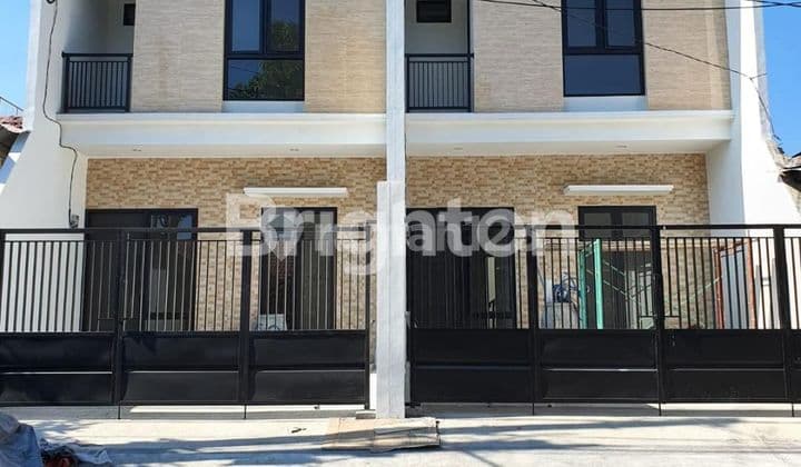 NIRWANA EXECUTIVE. NEW HOUSE 2LANTAI 1M'AN. BLOK DEPAN