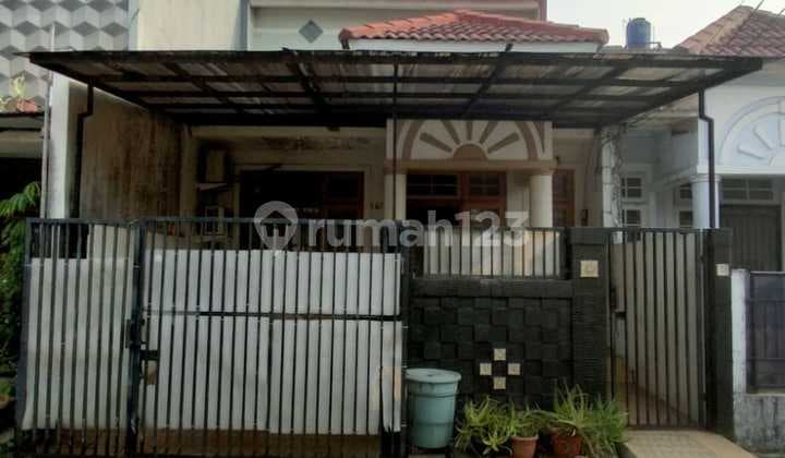Two-story house in Villa Ilhami on Mina Street, Islamic Kelapa Dua, Tangerang.