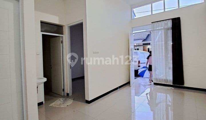 DISEWAKAN RUMAH TKI 5 MINIMALIS, WATER HEATER, GORDYN ....MURAH