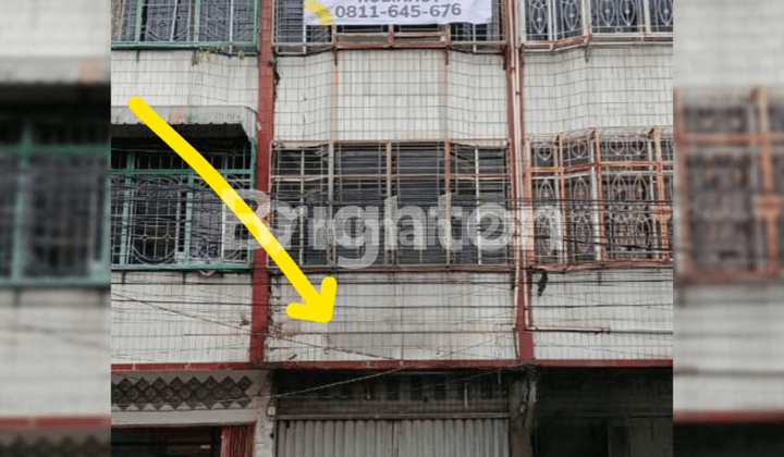 Shop House Jln. Brigjend Katamso in front of Singapore Station