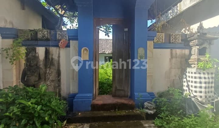 Tanah Dengan Bangunan Mangkrak