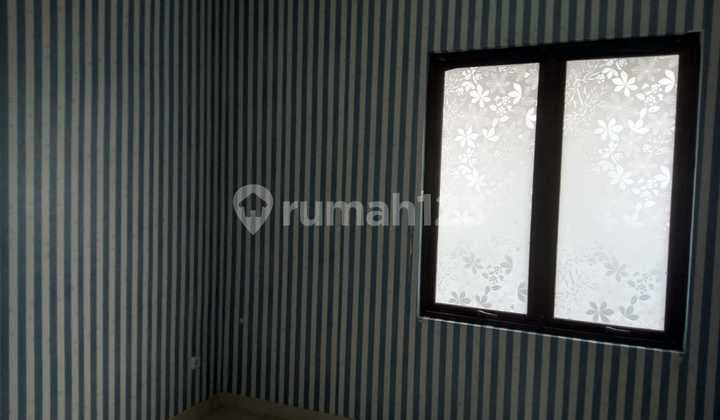 Disewakan Rumah 2 Lantai di Cluster Taman Sari, Harapan Indah Bekasi