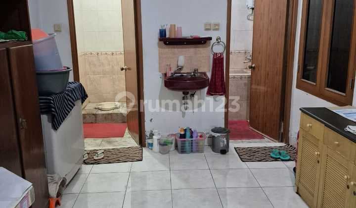 rumah terawat apik di dalam cluster komplek taman holis indah 2