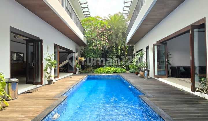 A House in Kemang with Bali Villa Vibes, Just a Stone's Throw from the Main Road, Cool