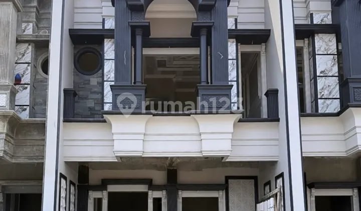 Rumah Mewah Klasik Dalam Cluster di Kalimulya Cilodong Depok