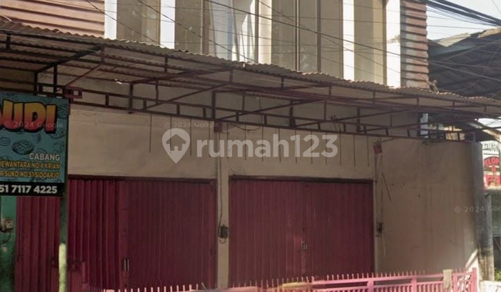 For Sale Strategic two-story shop house building in Surabaya.