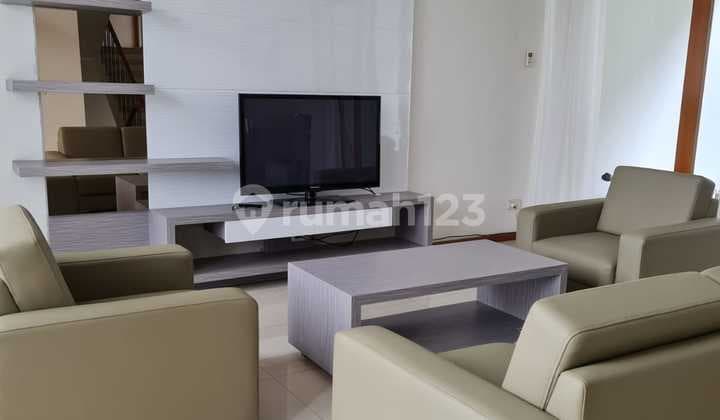 A well-maintained, clean, and tidy house located in Setra Duta, furnished.