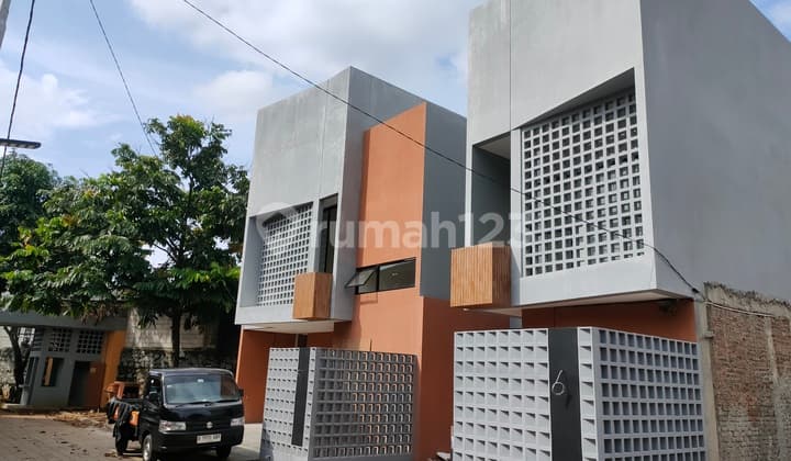Rumah Modern Industrial Dalam One Gate Cluster