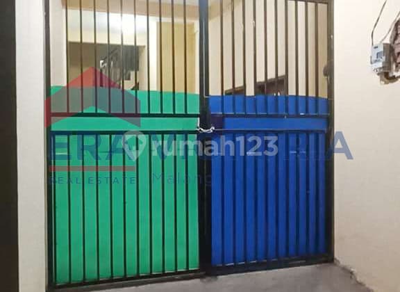 House in Densely Populated Area Near Unikama - Investment Opportunity