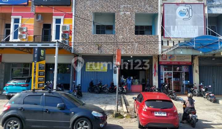 Ruko 2 pintu plus gudang di Jln.Sutomo (sebelah SPBU Marapalam)