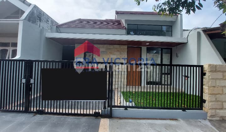 Rumah 1 1/2 lantai baru renovasi full bangunan di Sawojajar
