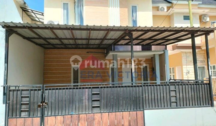 Rumah pojok minimalis cantik di Sulfat Indah