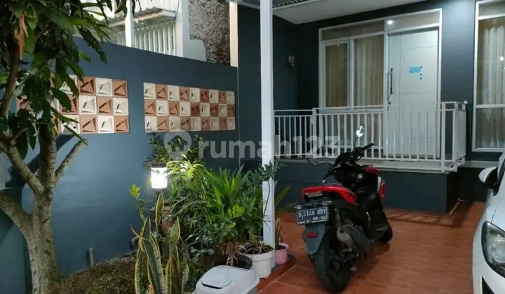 Rumah Modern Minimalis 2 Lantai di Awani Residence Kbb