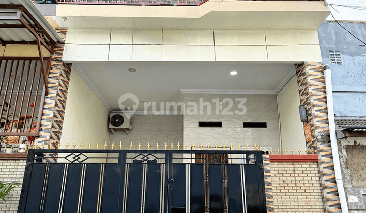 Rumah 2Lt 5X11 3Kt Semi Furnish bisa KPR di Perum Poris Tangerang