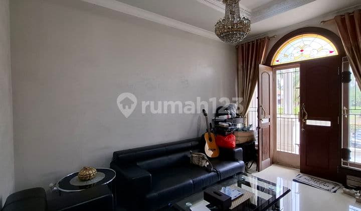 For Sale: 2-Story Luxury House with 450 M2 Land Area & Flood-Free on Main Boulevard of Kota Wisata!