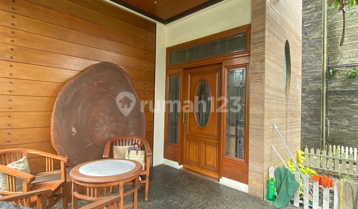 Well-maintained, charming furnished house in Cipaku Complex, Bandung. 2 stories, with a good Certificate of Ownership (SHM), East-facing.