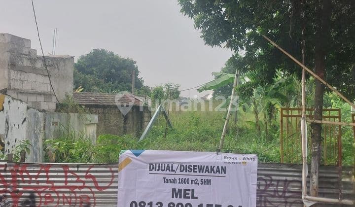 Tanah 1600 m2 Nempel Jalan Raya Sawangan Dekat Gerbang Tol Desari