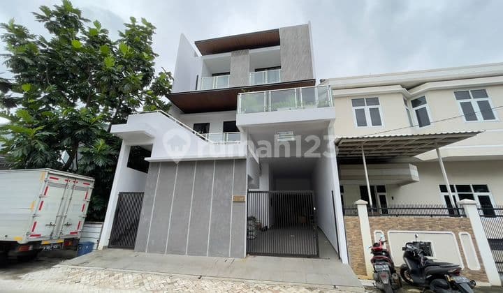 Rumah Taman Surya 3 .semi Furnished . 4 Lantai . Bagus Nego
