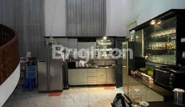 Well-Maintained, Ready-to-Occupy House in Dharmahusada, Steps Away from Galaxy Mall, Pakuwon City.