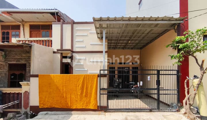 Rumah SHM Strategis 15 Menit ke Rs. Taman Harapan Baru Siap KPR J-30647