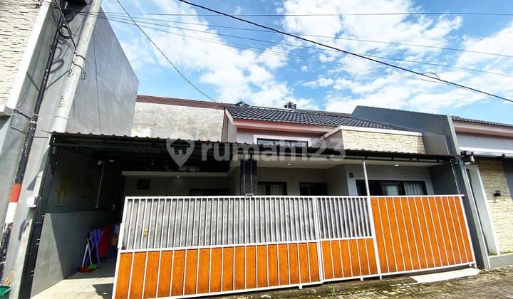 Rumah Bagus di Perumahan Cluster Berpagar Kanopi