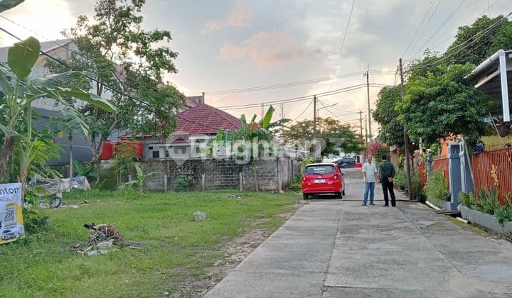 TANAH LUAS DIPINGGIR JALAN PERUMAHAN