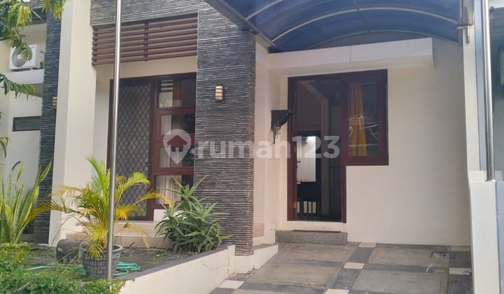 For Rent: Nice House at Jl. Woodland 10, Made, Sambikerep District, Surabaya, East Java, Citraland Fully Furnished.