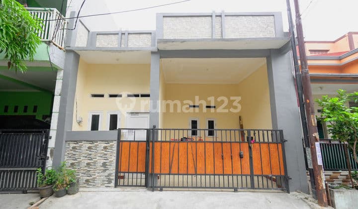 Rumah 10 menit ke Plaza Taman Harapan Baru SHM Siap KPR J-31972