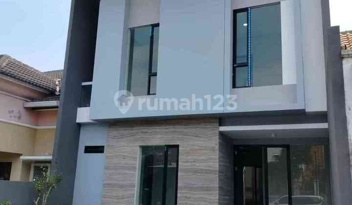 Rumah Modern Taman Puspa Raya Citraland Surabaya