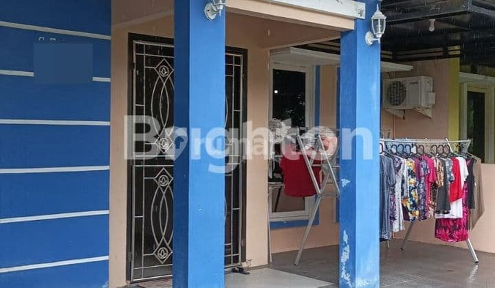Rumah Minimalis di Hook Tengah Kota
