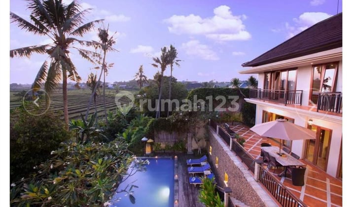 This three-bedroom villa for sale in Berawa features a modern and homely design, fully furnished for convenience. Enjoy the scenic ricefield view along with a completed pool and billiard, creating a perfect environment for family and friends to gather and