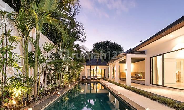 This three-bedroom villa for sale in Seminyak boasts a modern and charming single-floor design, fully furnished for immediate occupancy. Located close to Seminyak Beach, it features a completed pool, offering a delightful and convenient living space in th
