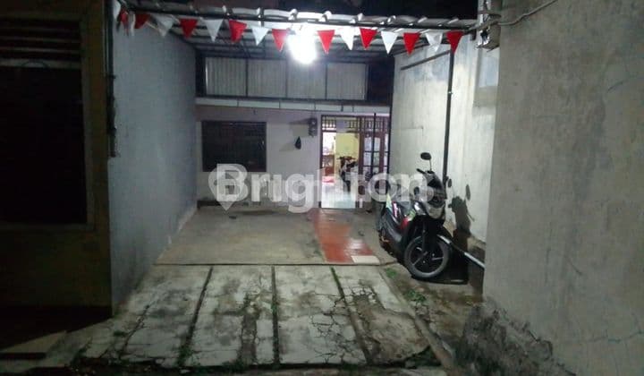 RUMAH DI KUKUSAN TEMPAT STRATEGIS DEKAT DENGAN JALAN RAYA