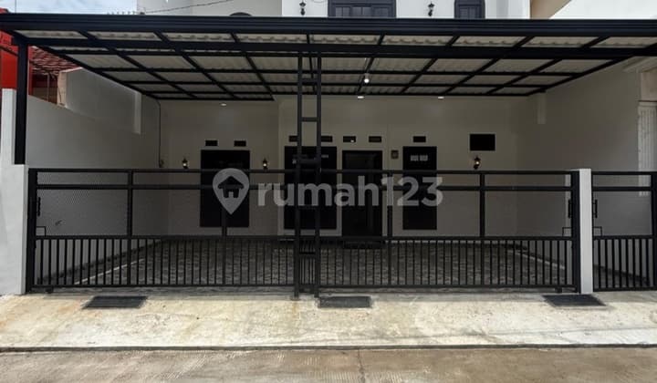 Rumah Model Klasik Modern di Pesona Anggrek Harapan Harapan Jaya