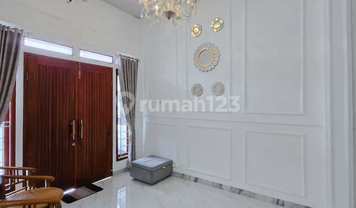 Rumah Minimalis 2 Lantai Dalam Cluster Graha Raya