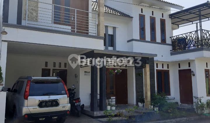 2-STORY HOUSE BY ASPHALT ROAD WITH HILL AND STAR VIEW