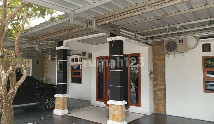 Modern minimalist house. Strategically located Graha Puri housing in front of the park.