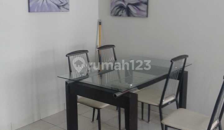 Apartment Cosmopolis Yang Asri di Tengah Kota Metropolis