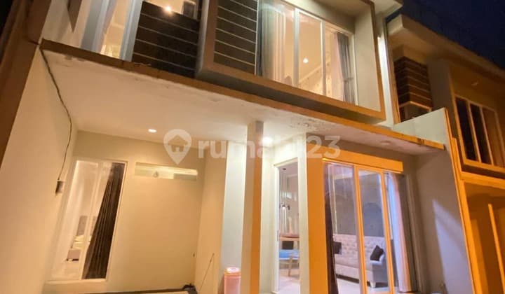 For Sale Beautiful Minimalist 2-Storey Villa with Bonus Fully Furnished and Rooftop, Ready to Occupy, Mountain View and City Lights, Safe and Quiet Environment, Cool Air, Strategic Location Near Transport Museum and Jatim Park 3 at Abdul Gani Batu H664.