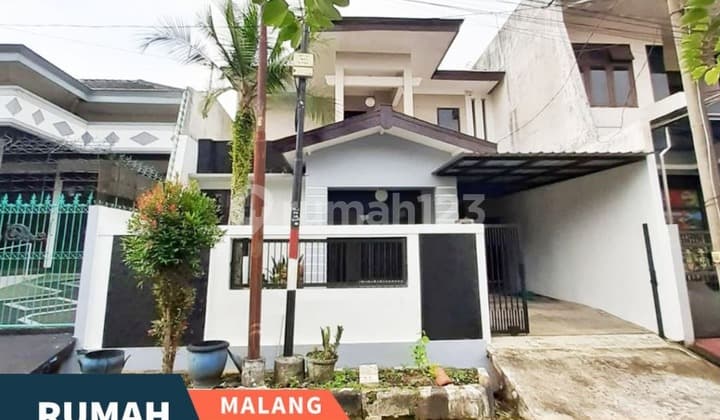 Low Price Sale of Well-Maintained 2-Storey Semi-Furnished House in Clean, Good Condition, Ready to Live in, Quiet and Comfortable Environment, Location Near Business Center and Commercial Area, Easy Access to Unmer and Ub Dieng Campuses in Dieng Tidar, Malang City, H985.